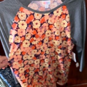 Lularoe XL Purple Randy T with peach floral pattern. Grey‎ raglan sleeves. NWT .